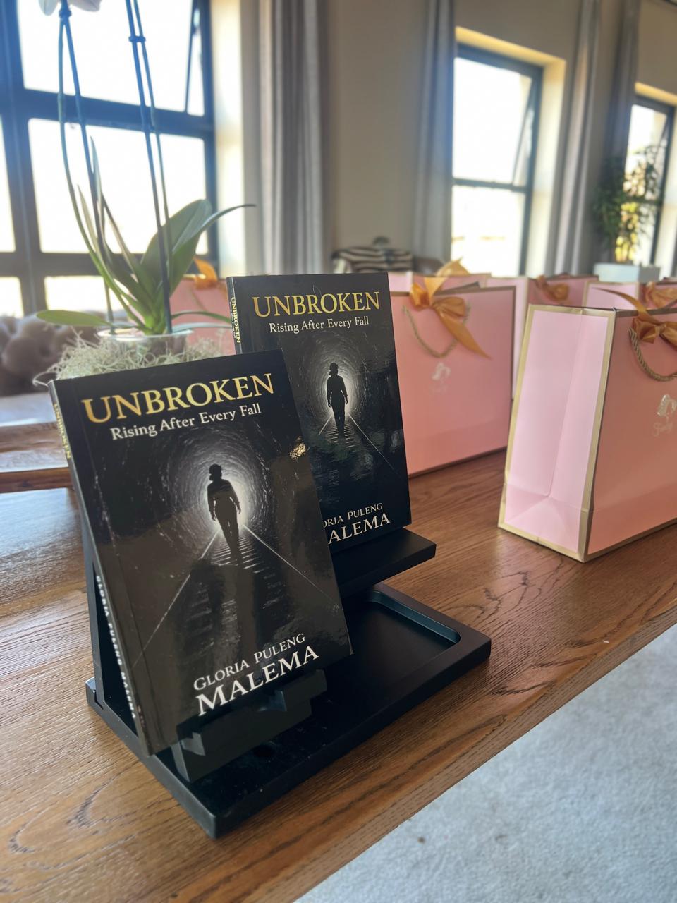 Copies of Unbroken displayed at the book launch